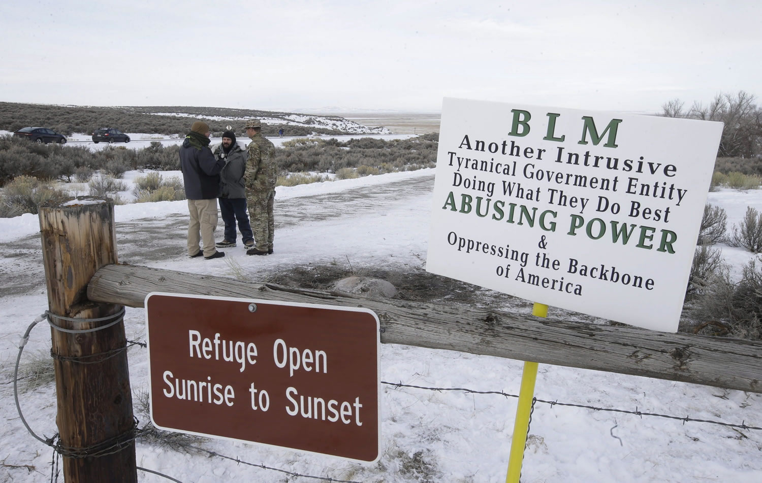 Members of the group occupying the Malheur National Wildlife Refuge headquarters stand guard Jan. 4, near Burns, Ore. Thousands of archeological artifacts and maps detailing where more can be found are stored at a national wildlife refuge currently being held by a group of armed protestors.