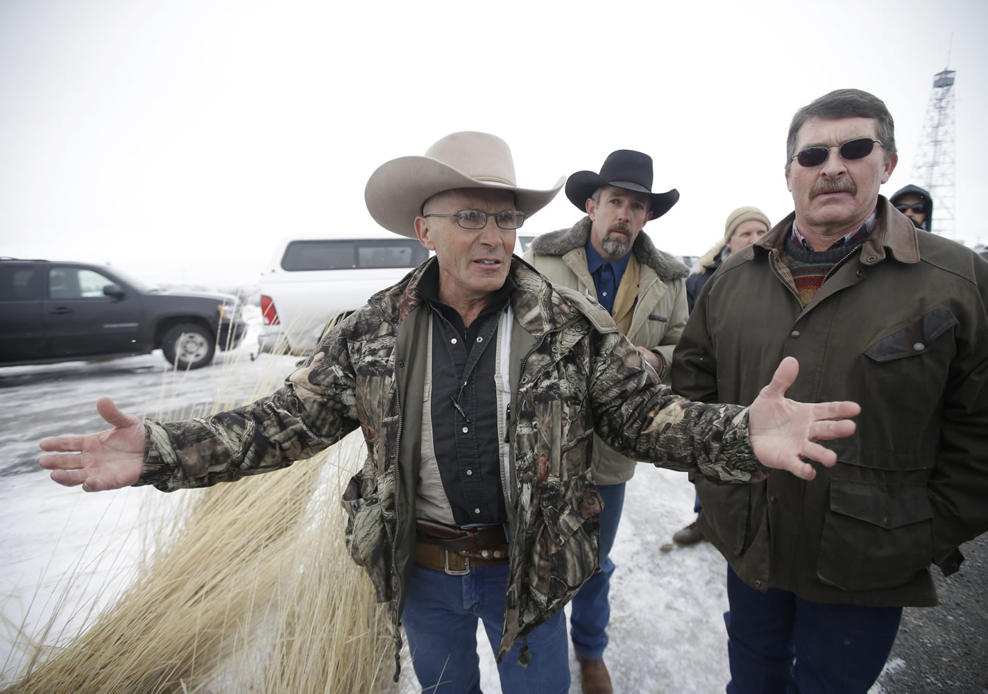 FILE - In this Jan. 9, 2016 file photo, LaVoy Finicum, a rancher from Arizona, speaks to the media after members of an armed group  along with several other organizations arrive at the at the Malheur National Wildlife Refuge near Burns, Ore.  The FBI and Oregon State Police arrested the leaders of an armed group that has occupied a national wildlife refuge for the past three weeks during a traffic stop that prompted gunfire  and one death  along a highway through the frozen high country. The Oregonian reported that  Finicum was the person killed, citing the man's daughter.