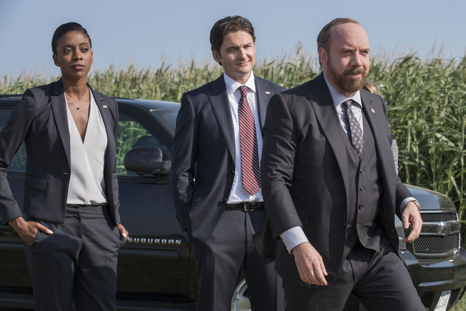 Condola Rashad, from left, Toby Leonard Moore and Paul Giamatti star in Showtime&#039;s series &quot;Billions.&quot; (Jeff Neumann/Showtime)
