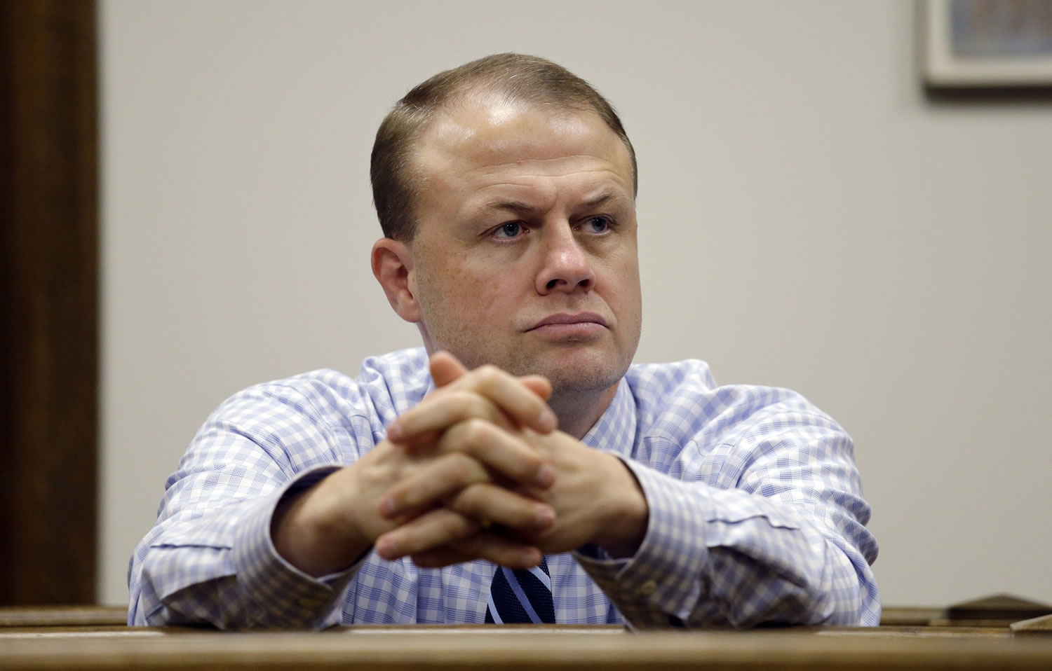 Tim Eyman looks on from the gallery during a hearing on the legality of his latest anti-tax measure in King County Superior Court in January in Seattle.