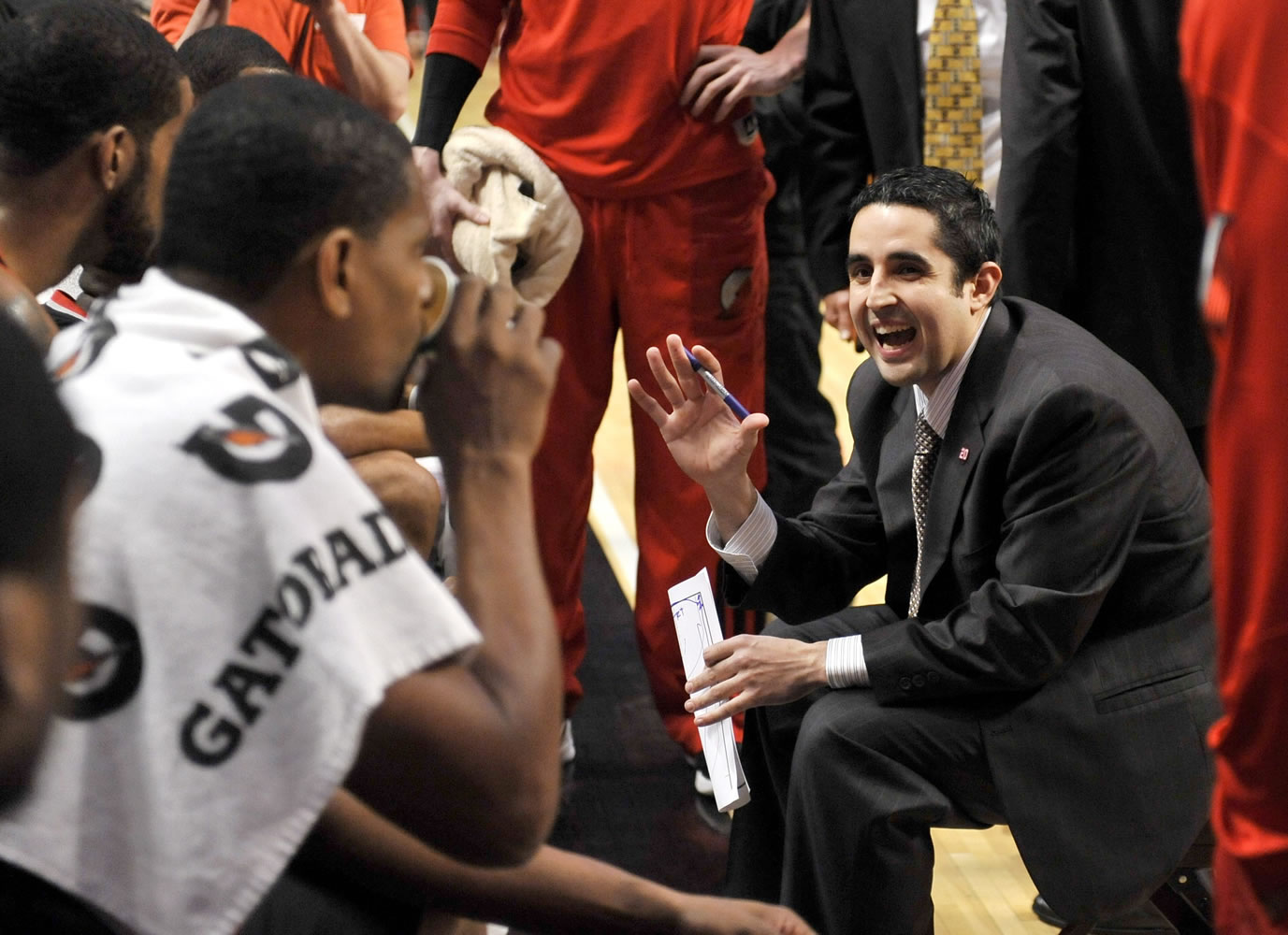 Portland Trail Blazers head coach Kaleb Canales talks to his team during a timeout in the first quarter of an NBA basketball game against the Chicago Bulls, Friday, March 16, 2012, in Chicago.
