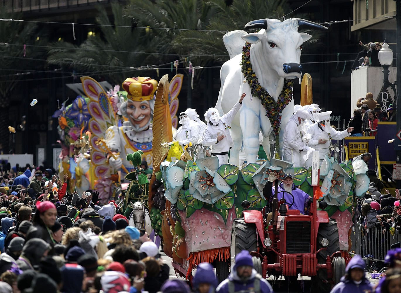 The Krewe of Rex parade rolls through downtown New Orleans last year on Mardi Gras in New Orleans. Mardi Gras this year falls on Feb. 9.