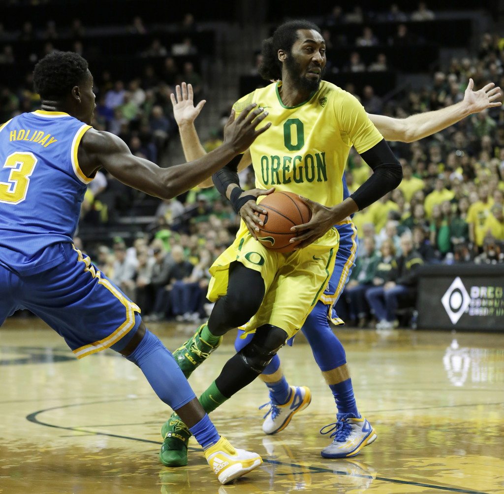 Oregon's Dwayne Benjamin, takes a step towards the basket during the first half of an NCAA college basketball game against UCLA Saturday, Jan. 23, 2016, in Eugene, Ore.