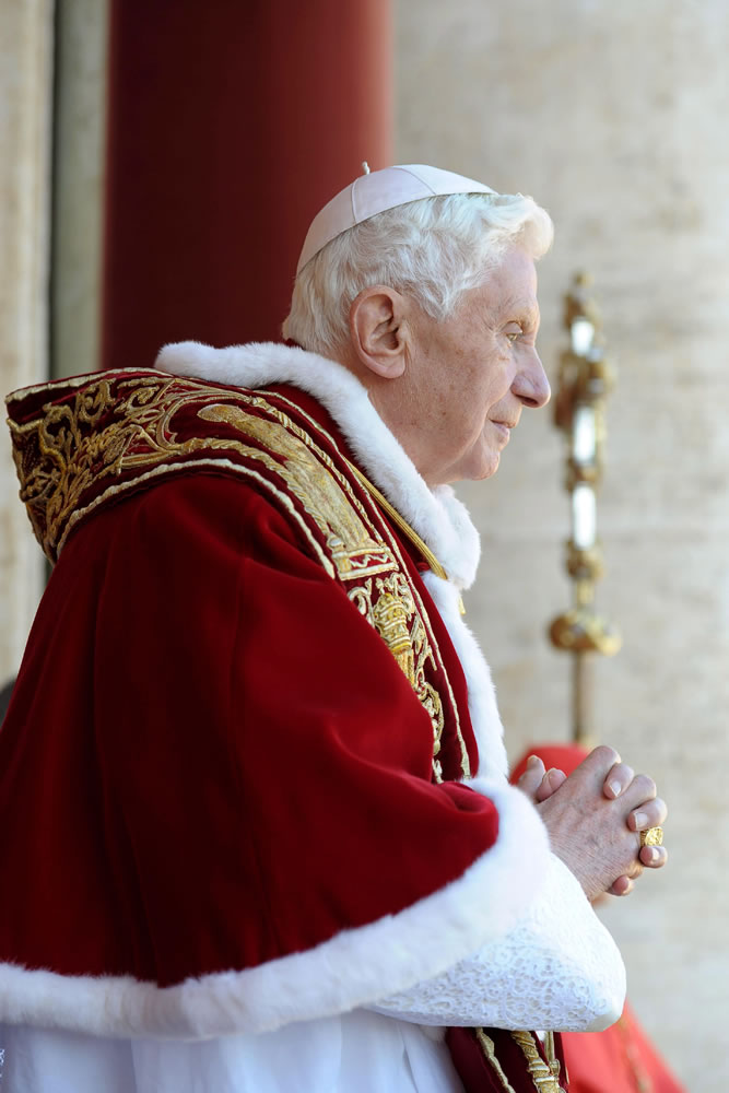 Pope Benedict XVI delivers his &quot;Urbi et Orbi&quot; (Latin for to the City and to the World) speech Sunday from St. Peter's Basilica at the Vatican.