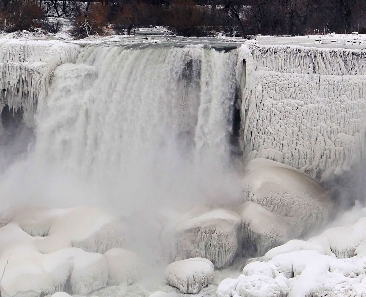 The United States side of Niagara Falls in New York has begun to thaw after the recent &quot;polar vortex&quot; that affected millions in the U.S. and Canada. Get ready for weather whiplash as climatic forces elbow each other for a starring role in making winter weird.