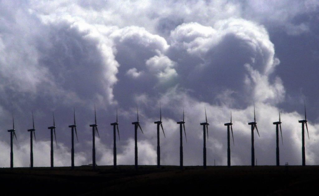 Wind turbines spin under cloudy skies along a ridge line in the Columbia River Gorge at FPL Energy's Stateline Wind Project on the Oregon-Washington border near Touchet on March 6, 2003. Washington's Energy Facility Site Evaluation Council recommended Thursday that Gov.
