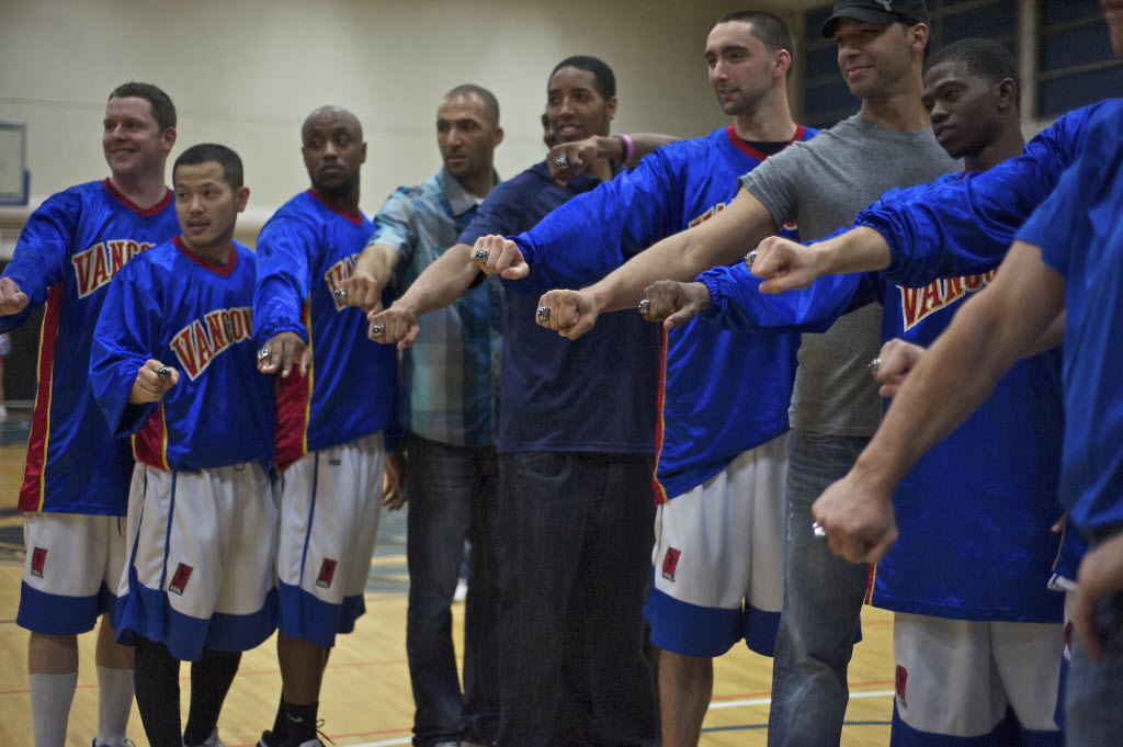 The Vancouver Volcanoes pose with their 2011 IBL Championship rings before their game against the Bellingham Slam at Clark College on Friday.