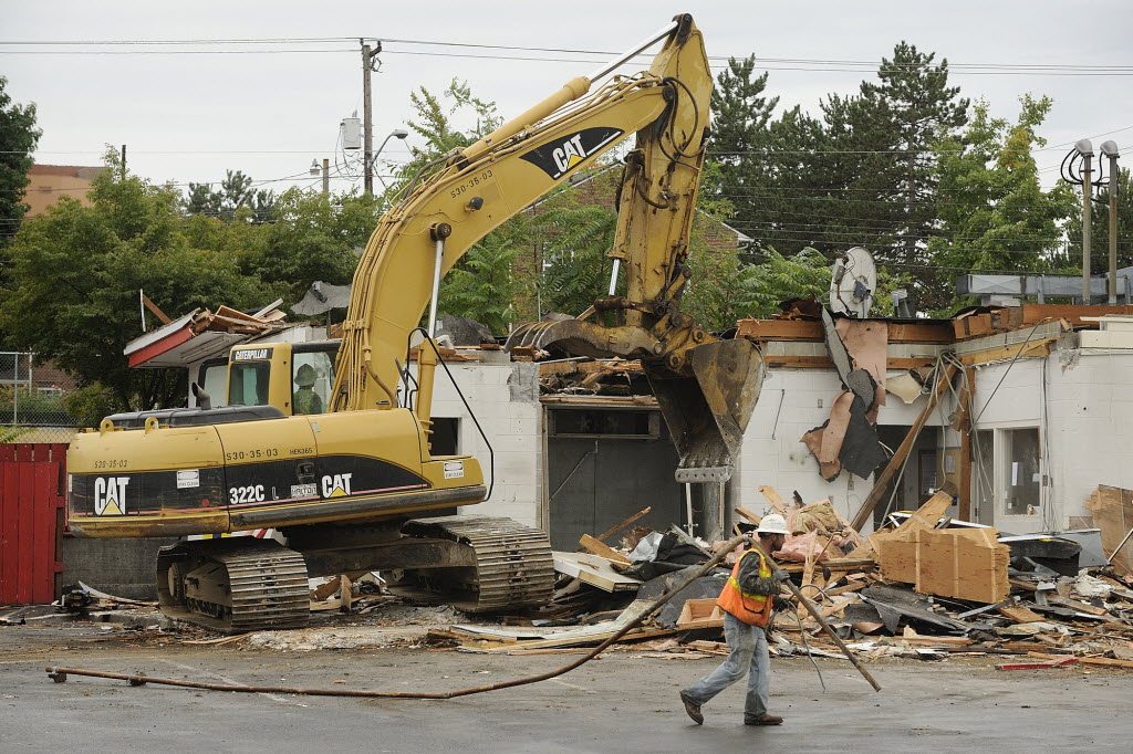 Construction crews and equipment began razing Vancouver's oldest Burgerville restaurant today.