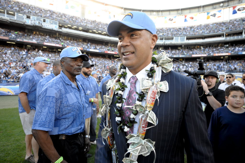 Former San Diego Chargers great Junior Seau smiles during his induction into the Chargers Hall of Fame in San Diego on Nov. 27, 2011. Police say Seau, a former NFL star, was found dead at his home in Oceanside, Calif., Wednesday.