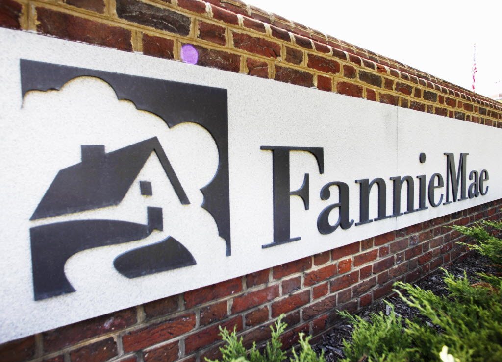 Standard &amp; Poor's Ratings Services on Monday downgraded the credit ratings of mortgage lenders Fannie Mae and Freddie Mac and other agencies linked to long-term U.S.