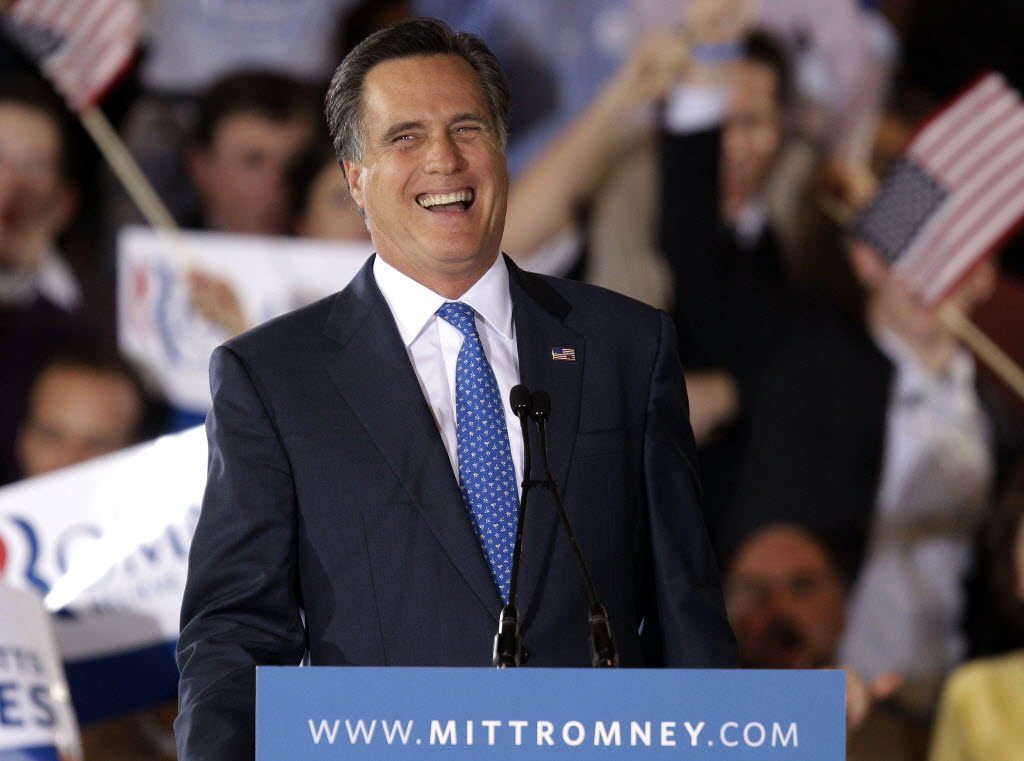 Republican presidential candidate Mitt Romney, former Massachusetts governor, smiles as he addresses supporters at his Super Tuesday campaign rally in Boston on Tuesday.