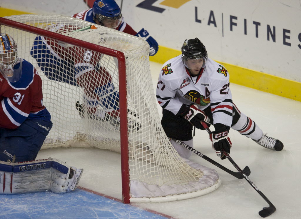 Winterhawks left wing Sven Bartschi can't complete the wrap-around play against the Oil Kings in the first period of game 6 at the Rose Garden on Saturday.