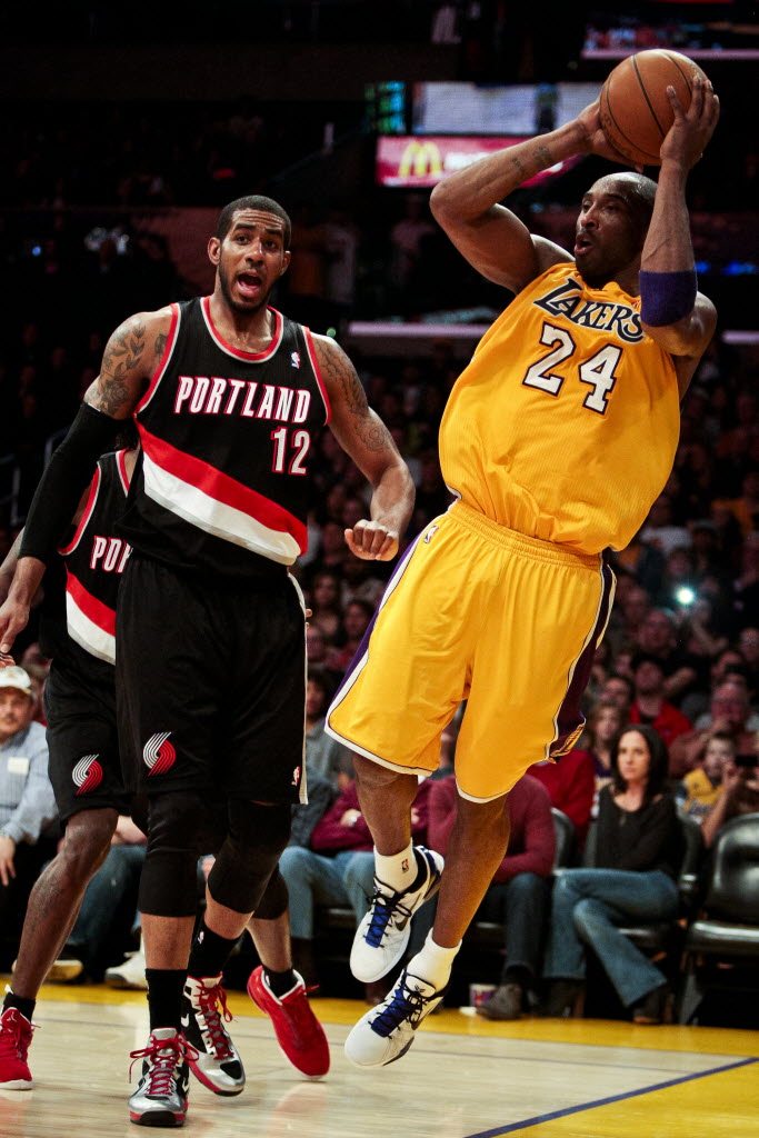 Los Angeles Lakers guard Kobe Bryant, right, become the youngest NBA player to score 30,000 points this week.