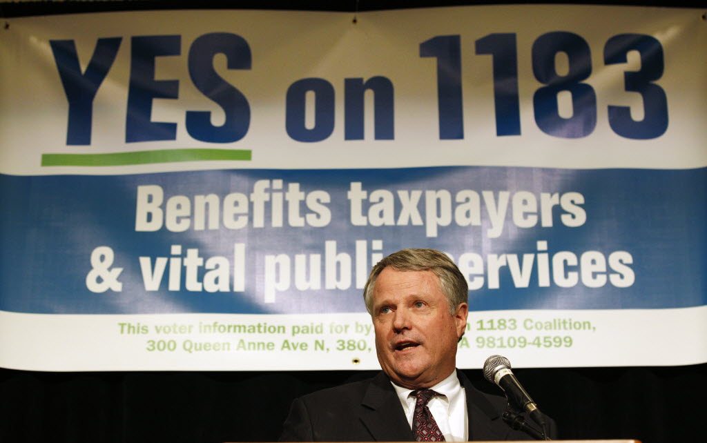 Washington Restaurant Association government affairs head Bruce Beckett speaks at an election night news conference for Yes on 1183 on Tuesday in Seattle.