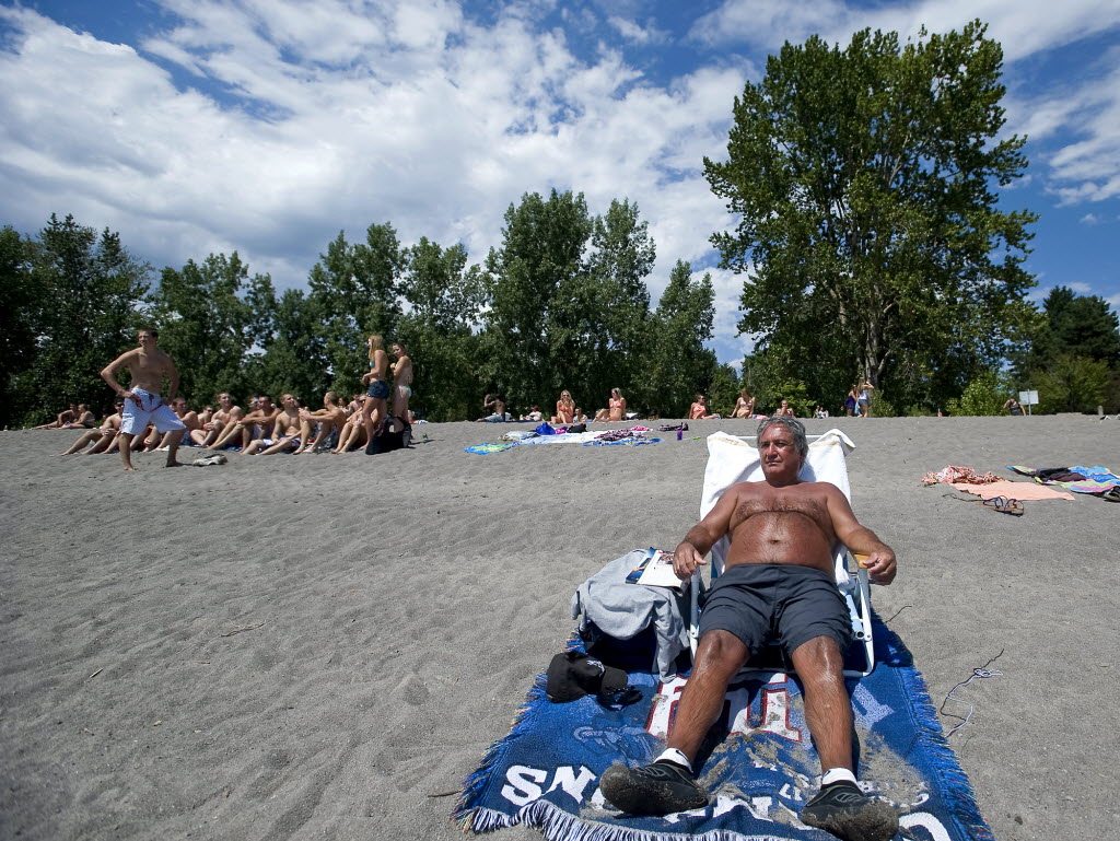 Frank Gianninoto, 59, of Vancouver, enjoys the sun at Wintler Park on July 24.