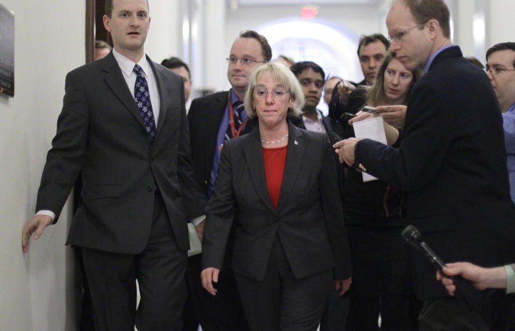 Supercommittee Co-Chair Sen. Patty Murray, D-Wash., arrives for a meeting in the Capitol Hill office of Sen. John Kerry, D-Mass., with other members of the deficit reduction panel Monday in Washington.