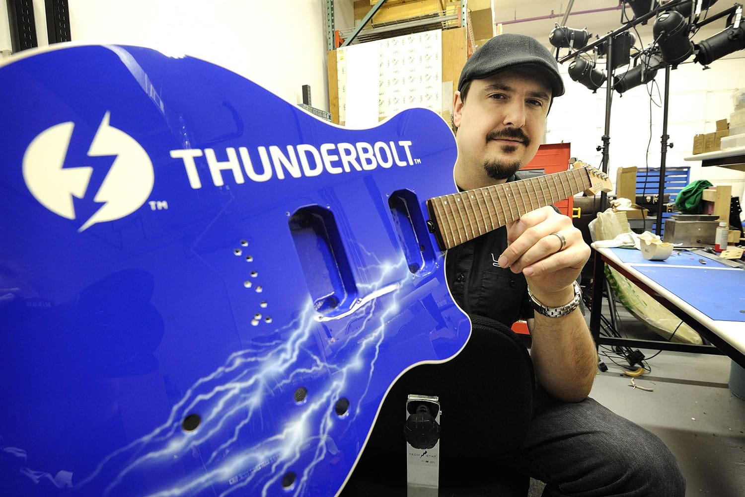 Marcus Young, co-owner and designer with Young Electric Guitars, shows off an instrument commissioned by Intel to showcase the tech firm's latest technology.
