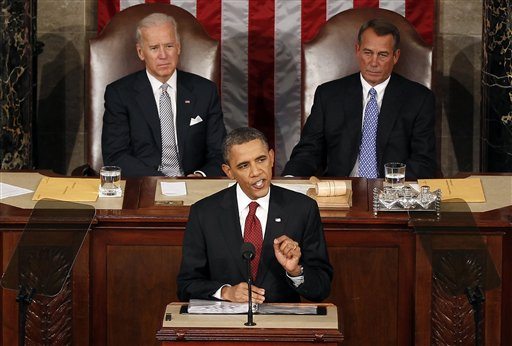President Barack Obama gestures while giving his State of the Union address on Capitol Hill in Washington, Tuesday.