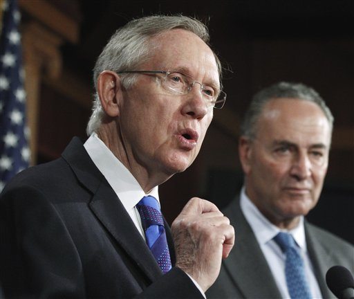Senate Majority Leader Sen. Harry Reid of Nev., left, accompanied by Sen. Charles Schumer, D-N.Y., speak about the President Barack Obama's jobs bill during a news conference on Capitol Hill in Washington, Wednesday Oct. 5, 2011.