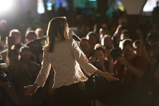 U.S. Rep. Michele Bachmann, R-Minn., greets supporters after a welcome home event in her hometown of Waterloo, Iowa Sunday, June 26, 2011. Bachmann said Sunday her bid to unseat President Barack Obama shouldn't be viewed as &quot;anything personal&quot; against the Democrat.