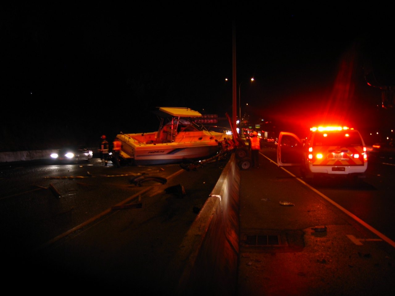 A boat ended up in the southbound lanes of Interstate 5 on Thursday after a truck hauling the boat northbound crashed into a concrete divider.