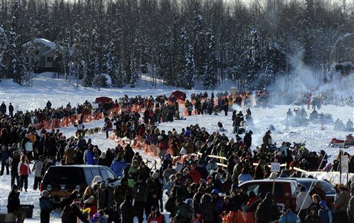 Ryan Redington takes the trail as the last musher to leave during the official start of the Iditarod Trail Sled Dog Race, Sunday in Willow, Alaska.