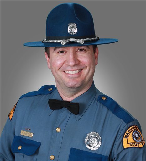 This undated photo provided by the Washington State Patrol shows Trooper Tony Radulescu. The Washington State Patrol identified Radulescu, 44, as the trooper killed near Port Orchard, Wash., early Thursday, Feb. 23, 2012. The agency says he was a 16-year veteran who served his entire career in the patrol's Bremerton district.