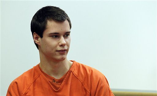 In this Dec. 16, 2011 file photo, Colton Harris-Moore, also known as the &quot;Barefoot Bandit,&quot; glances at the courtroom gallery as he walks to the defense table, in Island County Superior Court, in Coupeville, Wash. Harris-Moore is scheduled to be sentenced Friday, Jan. 27, 2012, in a U.S. federal court for his two-year international crime spree of break-ins and boat and plane thefts. (AP Photo/Ted S.