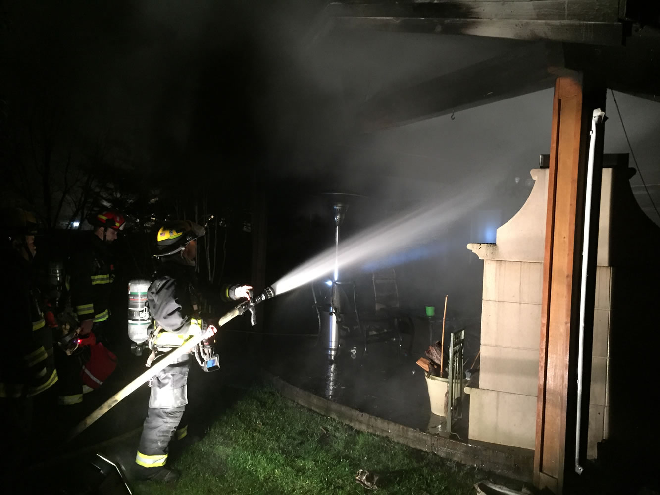 Crews from the Vancouver Fire Department put out a fire that damaged a hot tub and covered patio area, stopping the blaze from spreading to the residence.