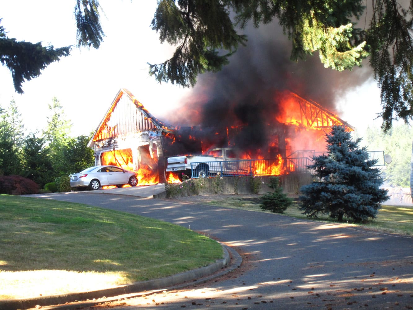 Fire burns a house at 38507 N.E. 124th Ave. on Saturday.