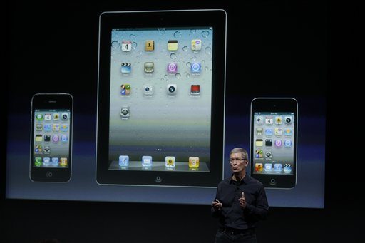 Apple CEO Tim Cook talks about iTouch, iPhone and iPad during announcement at Apple headquarters in Cupertino, Calif., Tuesday.
