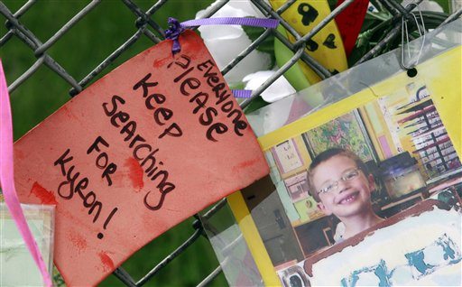 A weathered note hangs on a cyclone fence at &quot;Kyron's Wall of Hope&quot; Wednesday, May 11, 2011, in front of the Tualatin Valley Fire and Rescue station 368, in Portland, Ore. The &quot;Kyron's Wall of Hope&quot; is still standing nearly a year after his disappearance. Kyron Horman disappeared from Skyline Elementary School on June 4, 2010, at the age of 7 and remains missing. The investigation into Horman's disappearance is ongoing.