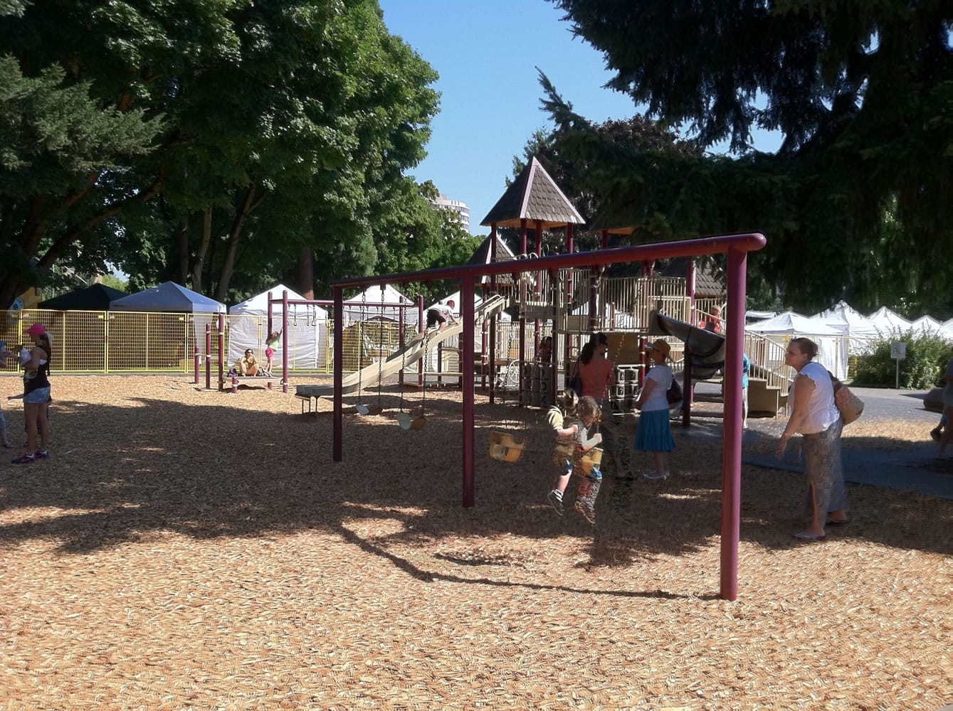 A playground at Esther Short Park provide a free sample of swinging music at the Vancouver Wine &amp; Jazz Festival next door.