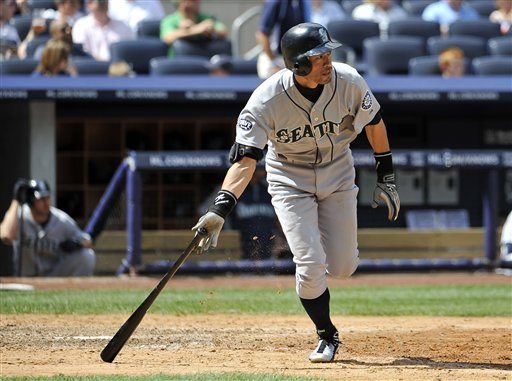 Seattle Mariners' Ichiro Suzuki hits a double off of New York Yankees pitcher Cory Wade in the seventh inning of a baseball game Wednesday.