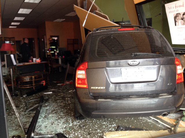 A car ran into an insurance office at a shopping complex off Southeast 192nd Avenue in east Vancouver Wednesday morning.