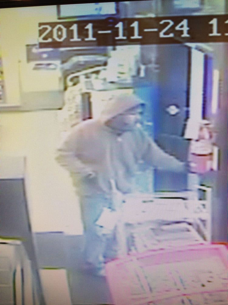 Surveillance video of the suspect in an armed robbery at Speed-E Mart, 3208 E.
