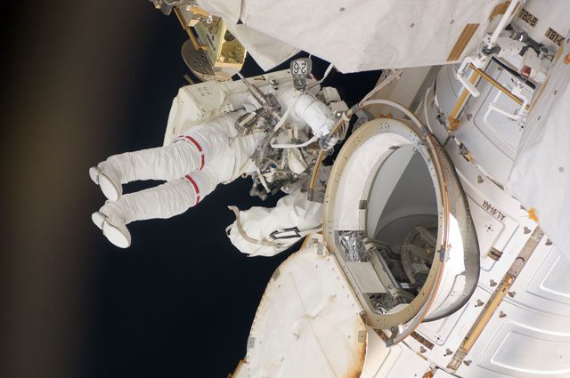 NASA astronaut Greg Chamitoff, STS-134 mission specialist, nears the completion of his role in the Endeavour mission's first session of extravehicular activity on May 20.
