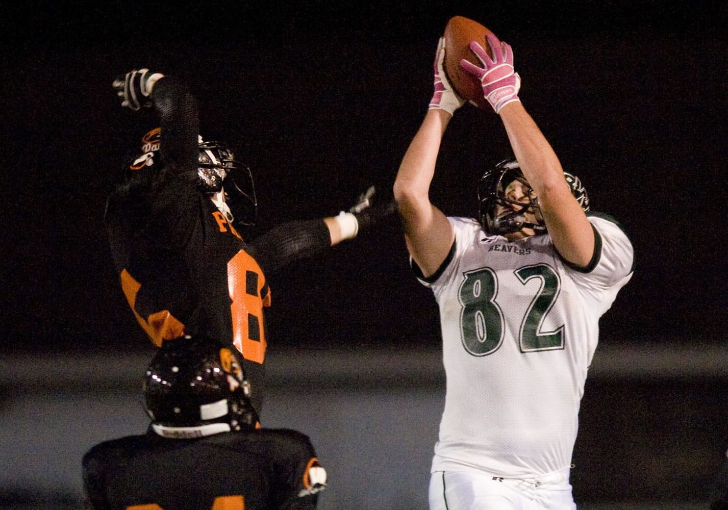 Woodland's Nick Fuller, #82, hauls in the game winning touchdown pass in overtime to beat Washougal 35-28 at Fishback Stadium in Washougal, Firday, October 14, 2011.