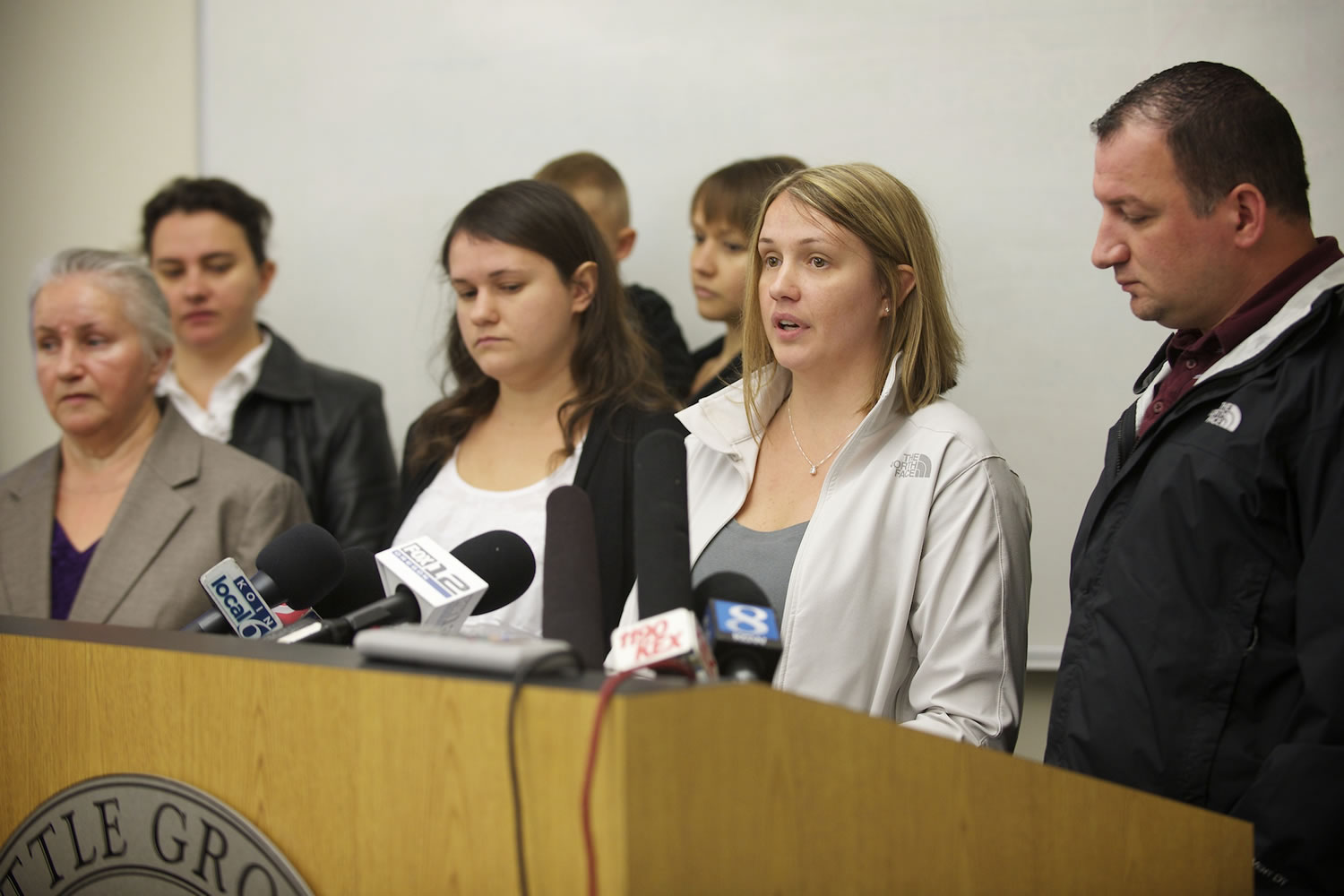 Olga Tupikova, center, and family members ask for the public's help finding out what happened to Tatyana Tupikova during a press conference at the Battle Ground Police Department on Friday.