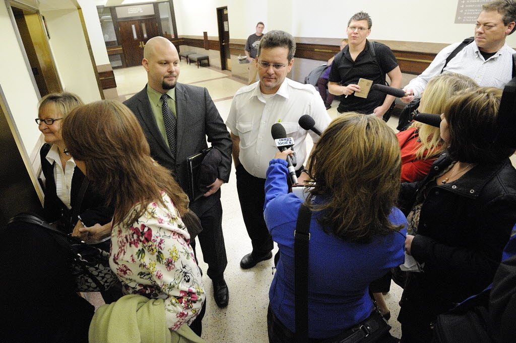 Tim Graf, the ex-husband of suspect Sandra Weller, talks with reporters this morning outside a courtroom.