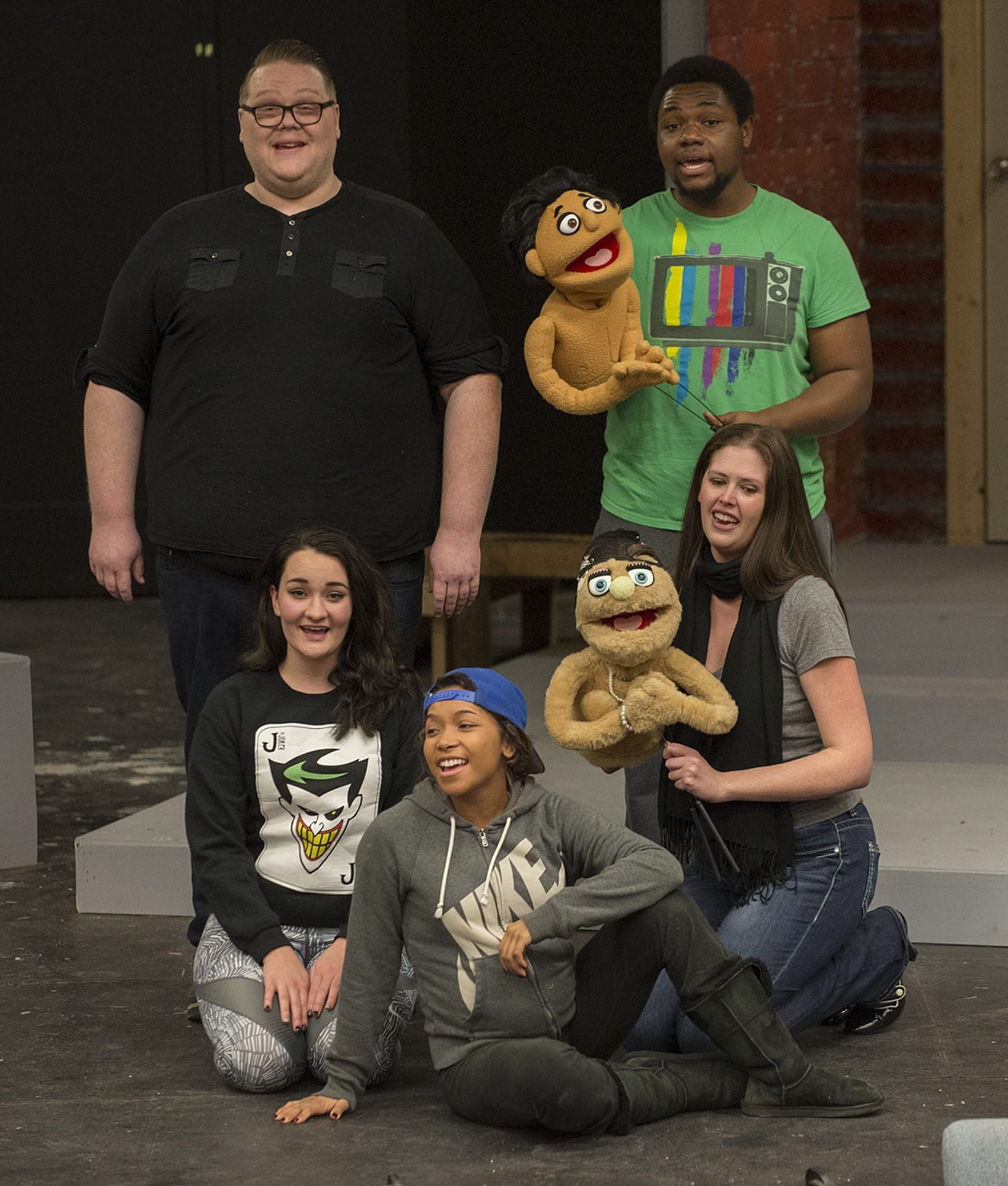 Tristan James as Brian (clockwise from top left), Timothy Busch with puppet Princeton, Jacqueline Baxter with Kate Monster, Kiara Gaulding as child star Gary Coleman -- yes, THAT Gary Coleman -- and Kennedy Marvin as Christmas Eve prepare for the upcoming Clark College musical production of &quot;Avenue Q.&quot; (Amanda Cowan/The Columbian)