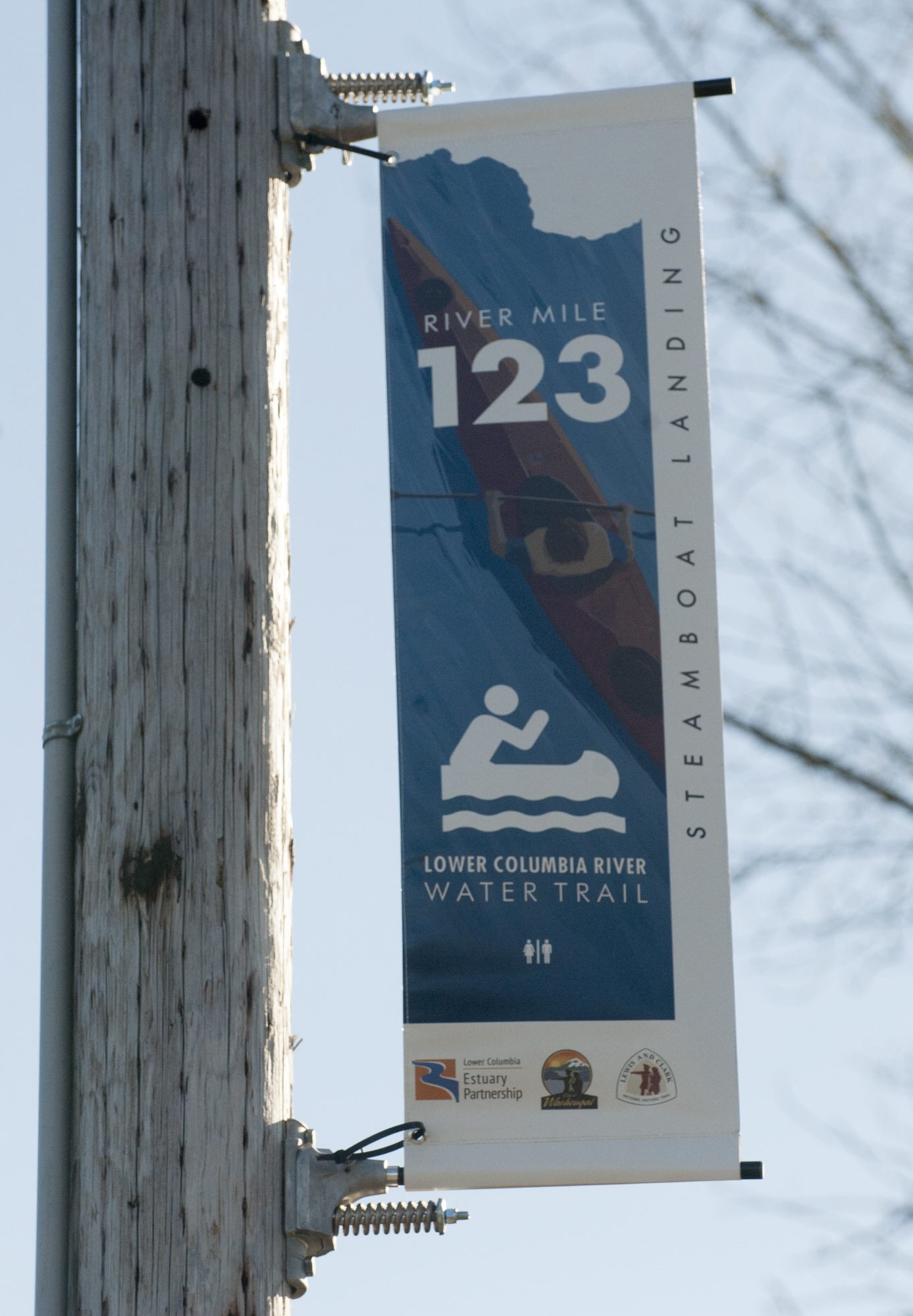 A sign for the Lower Columbia River Water trail hangs at the Port of Camas-Washougal. Stakeholders along the river are posting signs at the water to designate the Columbia River Trail and cater more to non-motorized users.