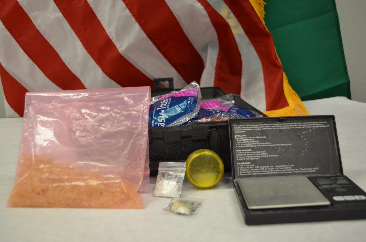 Washougal Police officers arrested a local man and seized about 49 grams of methamphetamine and other drug paraphernalia, shown here, as part of a search Thursday.