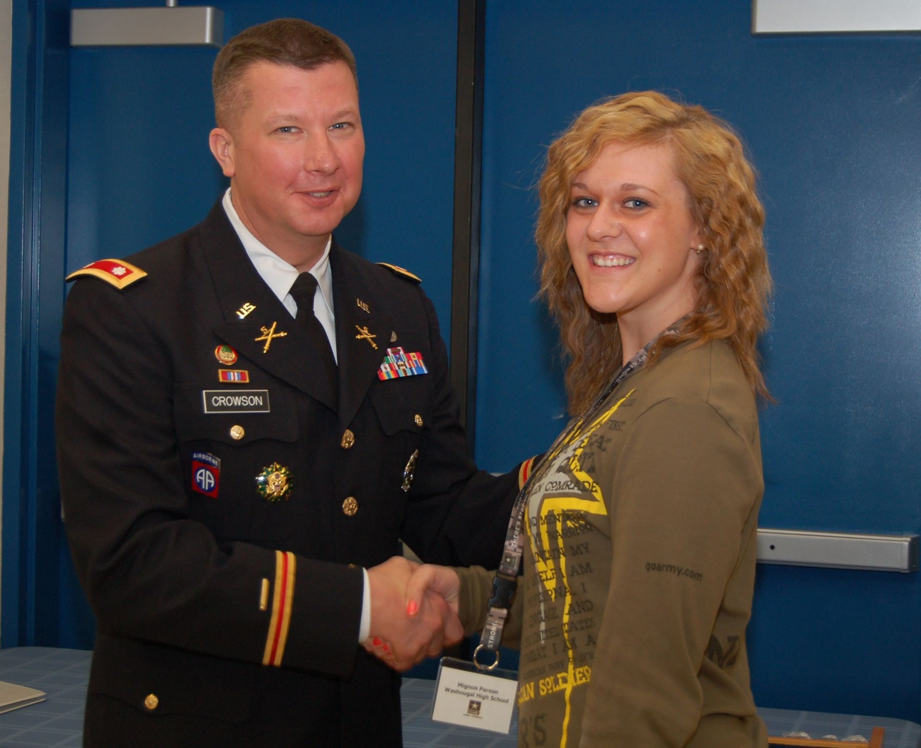 U.S. Army Future Soldier Mignon Parson from Washougal High School receives Military coin from U.S. Army Recruiting Battalion Portland Commander Lt. Col.