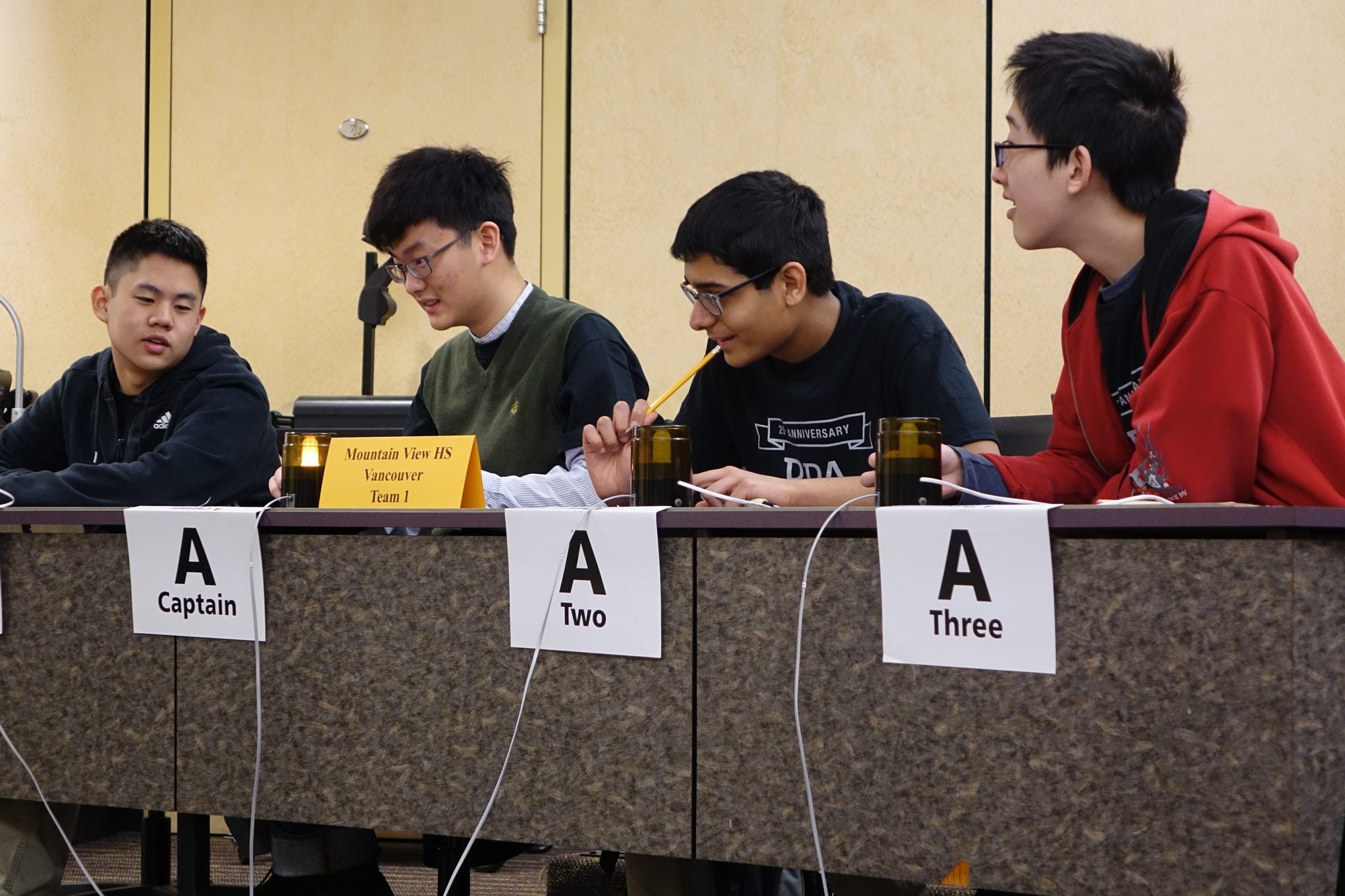 Mountain View High School Team 1 of the Evergreen School District performed the best of the schools in your readership. They persevered through Round 10 in the afternoon Double Elimination Rounds. Pictured are Mark Chen, team captain Ming Liu, Suyash Gupta and Kevin Gao.