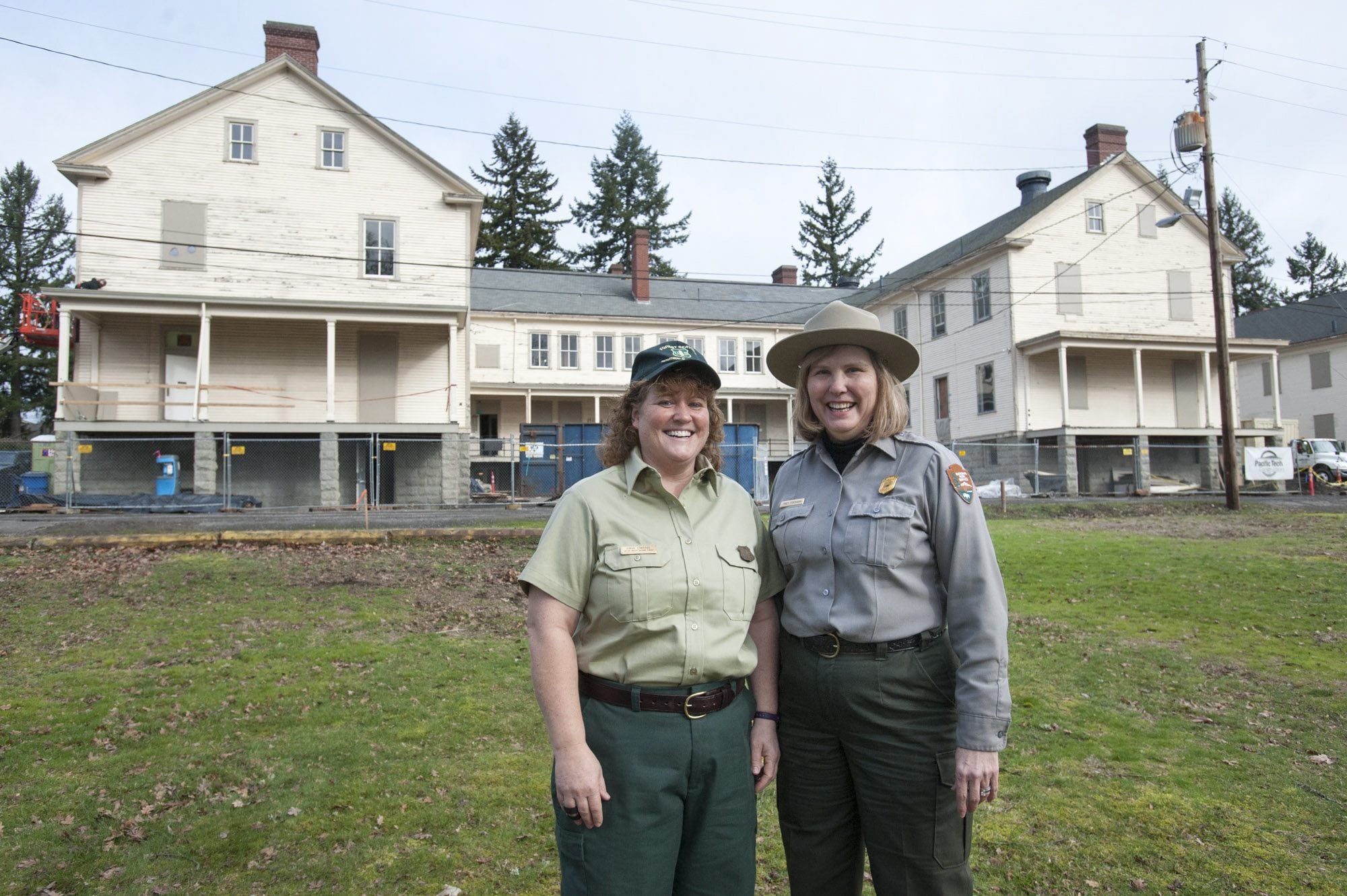 Gifford Pinchot National Forest Supervisor Gina Owens, left, stands Tuesday with National Park Service Superintendent Tracy Fortmann in front of the Gifford Pinchot&#039;s future headquarters in East Barracks Building 987 on the Fort Vancouver National Site.