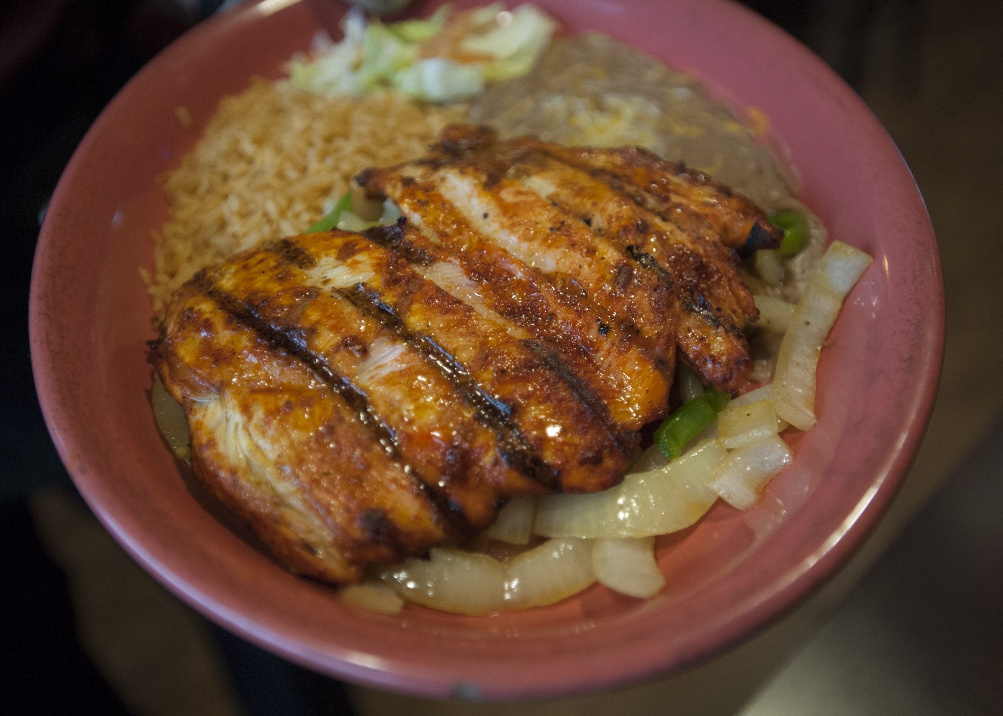 Pollo asado, a grilled boneless fillet of chicken with green pepper and mushrooms, is served Feb. 4 at Los Potrillos Mexican Restaurant in east Vacouver. The dish costs $15.95.