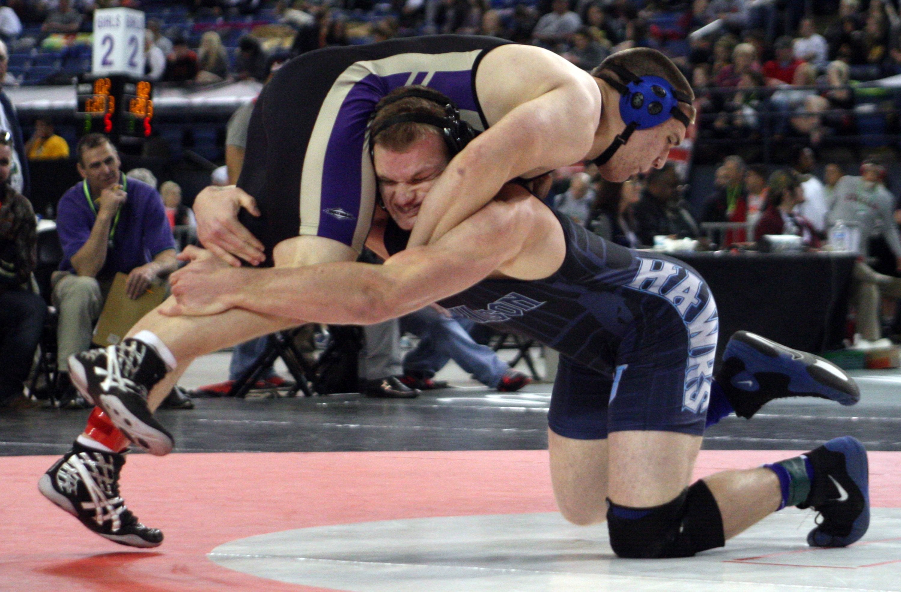 Hockinson's 220 pounder Cameron Loos takes down Sequim's Michael Latimer to earn two points on Friday, Feb, 19, 2016 at the Mat Classic XXVIII held in the Tacoma Dome. Loos went onto win his match 5-3.