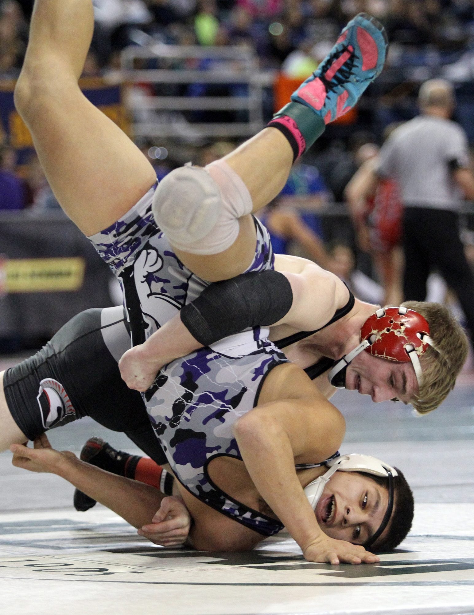 Union's Tommy Strassenberg takes down Yelm's Chayton Miller to earn two points in their 152 pound match on Friday, Feb, 19, 2016 at the Mat Classic XXVIII held in the Tacoma Dome.