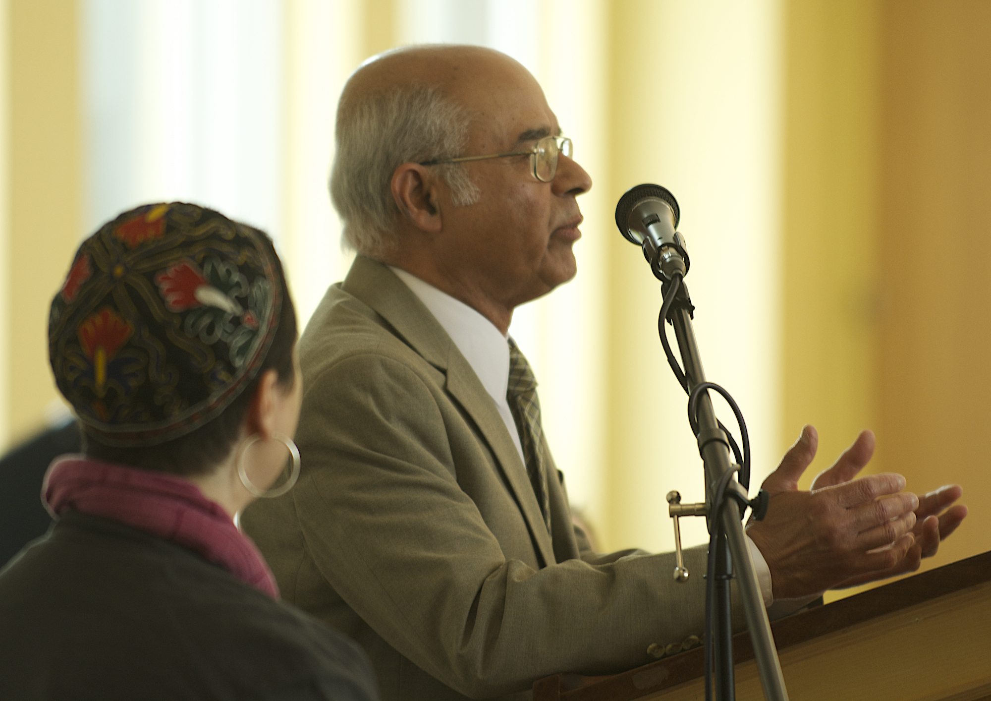 Dr. Khalid Khan of the Islamic Society of Southwest Washington gives a blessing at an interfaith breakfast in 2014.